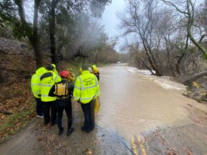 Water Rescue First Responders at Flooded Roadway